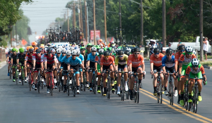 (Rick Egan  |  The Salt Lake Tribune)  The peloton rides thought Layton, in the Tour of Utah stage 5, Friday, August 4, 2017.



