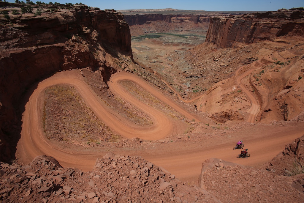 (Francisco Kjolseth | Tribune file photo) Mountain bikers near the end of their 75-mile trip as they make the steep climb on the Mineral Bottom Road after riding the White Rim Trail in Canyonlands National Park in May 2013. Roads like Mineral Bottom and White Rim will be open to ATVs starting Nov. 1 under a National Park Service policy change that applies only to Utah parks.