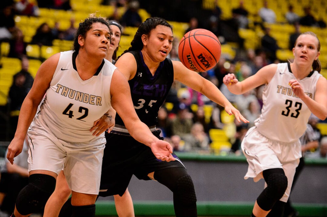 (Trent Nelson | The Salt Lake Tribune)  Lehi vs. Desert Hills, 4A State high school basketball tournament at Utah Valley University in Orem, Thursday March 1, 2018. Desert Hills's Jessica Bills (42) and Lehi's Apelila Galeai (35).