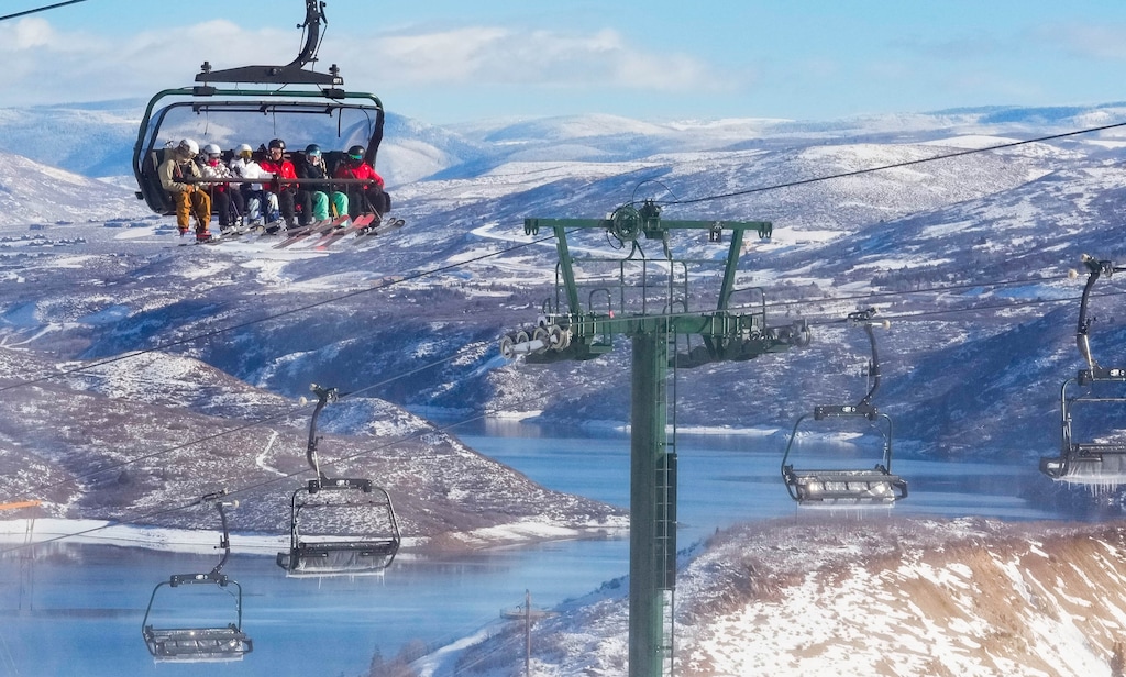 (Francisco Kjolseth | The Salt Lake Tribune) Skiers ride Deer Valley Resort's new Keetley Express during its maiden voyage Tuesday, Dec. 31, 2024. The high-speed, six-person bubble lift is the first to operate out of the resort's new East Village base and gives skiers access to some of the more than 3,000 acres of new terrain Deer Valley plans to open in the coming years.