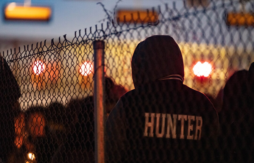 (Francisco Kjolseth | The Salt Lake Tribune) More that a hundred people gather at the candlelight vigil of Hunter High football players Paul Tahi , 15, Tivani Lopati, 14, and Ephraim Asiata, 15, on Friday, Jan 14, 2022, in West Valley City, near Hunter High School along 1400 South at Mountain View Corridor. Paul Tahi and Tivani Lopati were killed in a shooting, while Ephraim Asiata remains in critical condition.