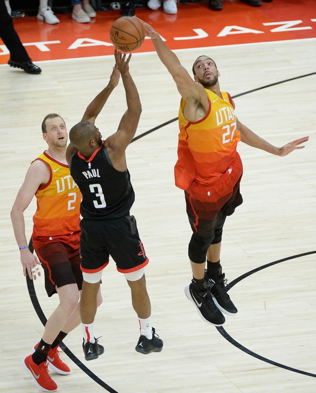 (Francisco Kjolseth  |  The Salt Lake Tribune)  Houston Rockets guard Chris Paul (3) tries to clear the reach of Utah Jazz center Rudy Gobert (27) in Game 3 of a first-round NBA basketball playoff series in Salt Lake City, Saturday, April 20, 2019.