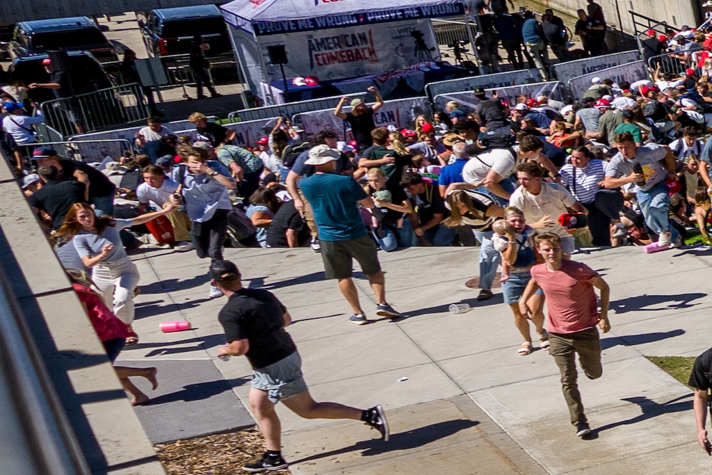 (Trent Nelson | The Salt Lake Tribune) People react after Charlie Kirk is shot during an appearance at Utah Valley University in Orem on Wednesday, Sept. 10, 2025.