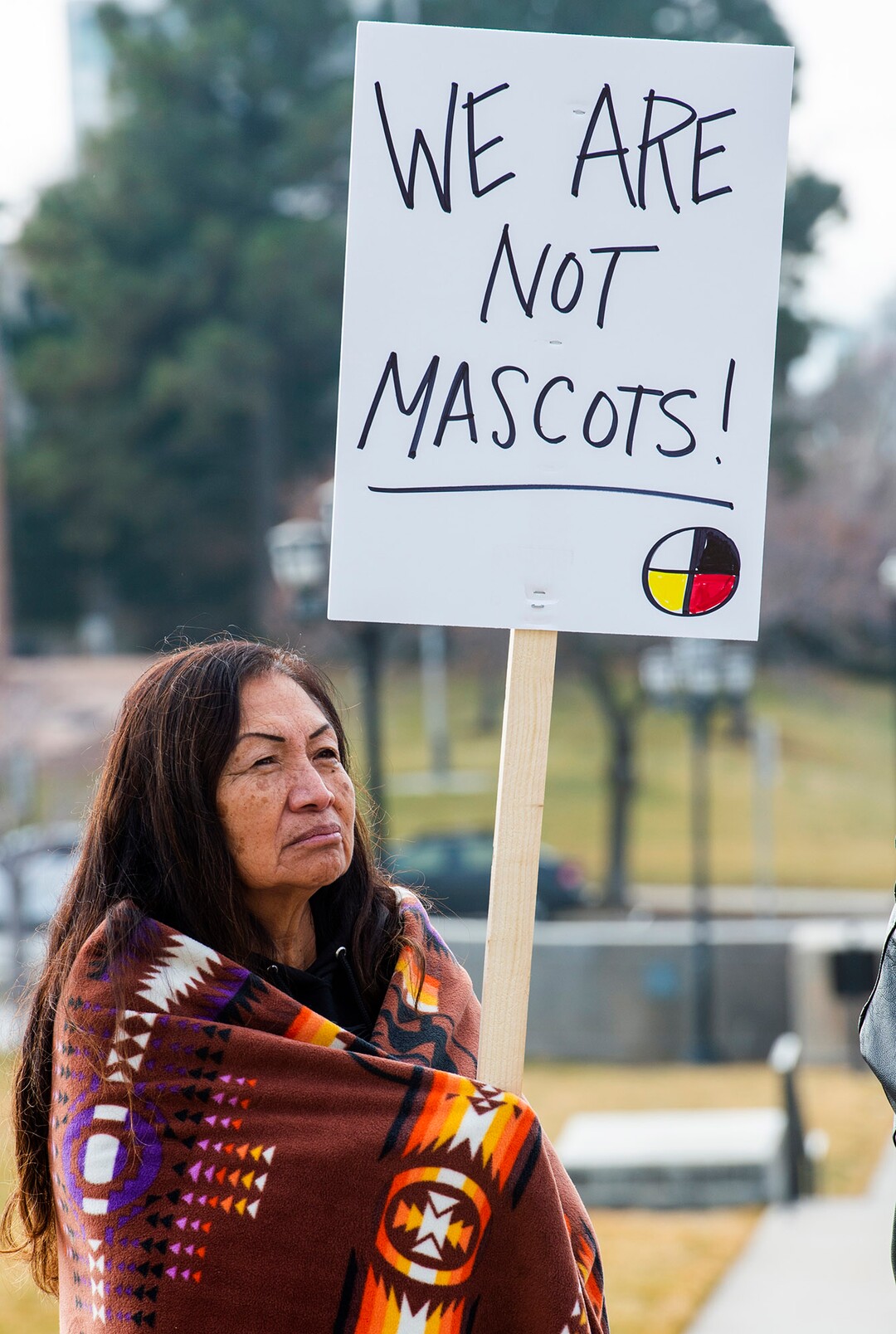 (Rick Egan  |  The Salt Lake Tribune)    Jeanie Groves makes a statement as Native Americans and their supporters gather on the steps of the Utah State Capitol for a rally to oppose a resolution that would discourage the removal of Native American names or symbols from school mascots, Saturday, Jan. 25, 2020.