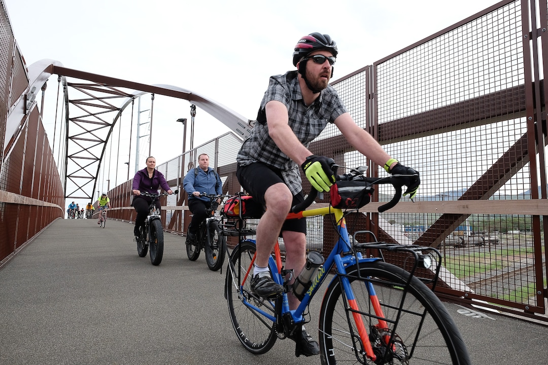 (Francisco Kjolseth  |  The Salt Lake Tribune)  People join Salt Lake City Mayor Jackie Biskupski on Thursday, May 16, 2019, as part of the annual MayorÕs Bike to Work Day. This yearÕs ride began at the Northwest Recreation Center and ran primarily along the Jordan River Trail in an effort to show off the investments the city and others have made to the trail including the new 120-foot arch bridge that connects the north and south sides of the trail between 200 South and North Temple.