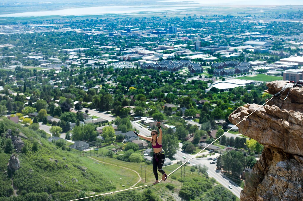 (Rick Egan  |  The Salt Lake Tribune) Sienna Pickard, 22, from Salt Lake City, walks a slackline between two peaks at the mouth of Rock Canyon in Provo, Tuesday, May 29, 2018.