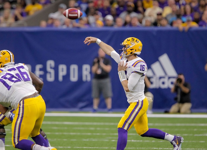 LSU quarterback Danny Etling (16) passes against BYU in the first half of an NCAA college football game in New Orleans, Saturday, Sept. 2, 2017. (AP Photo/Scott Threlkeld)