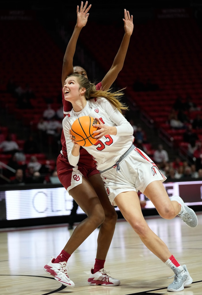 (Francisco Kjolseth | The Salt Lake Tribune) Utah Utes forward Kelsey Rees (53) moves past Oklahoma Sooners forward Kiersten Johnson (5) as the University of Utah hosts the Oklahoma Sooners in women’s NCAA basketball in Salt Lake City on Wednesday, Nov. 16, 2022.
