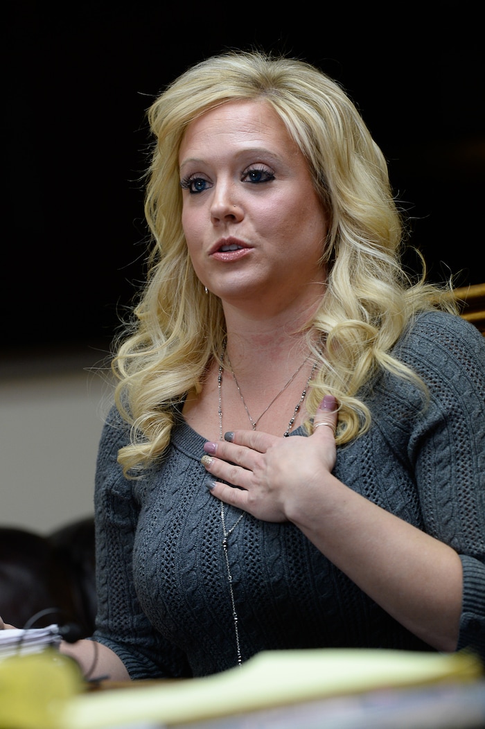 (Francisco Kjolseth | The Salt Lake Tribune) Heather Leyva, a single mother of three, describes the unwanted sexually charged messages she received from Utah trooper Sgt. Blaine Robbins. Leyva was joined by attorney Robert Sykes, as they discussed the sexual harassment lawsuit he is filing on her behalf against the trooper during a press conference at his law offices in Salt Lake City Wed. Feb. 7, 2018.