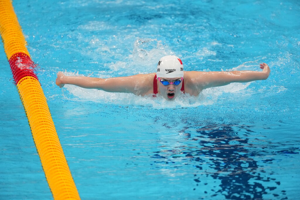 (Doug Mills | The New York Times) Zhang Yufei of China swims to gold in the women's 200 meter butterfly final during the Tokyo 2020 Olympics, at the Tokyo Aquatics Center, July 29, 2021.