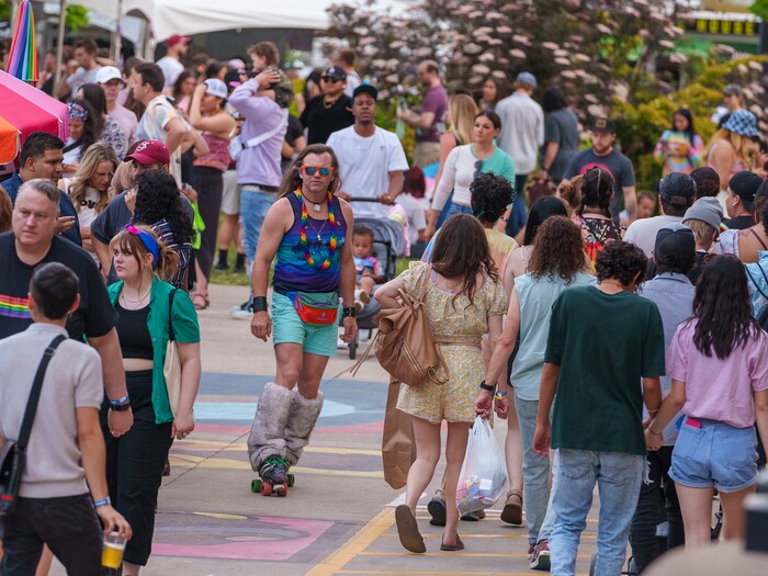 (Leah Hogsten | The Salt Lake Tribune)  Pride festival revelers enjoy the Utah Pride Festival at Washington Square, Saturday, June 4, 2022. 