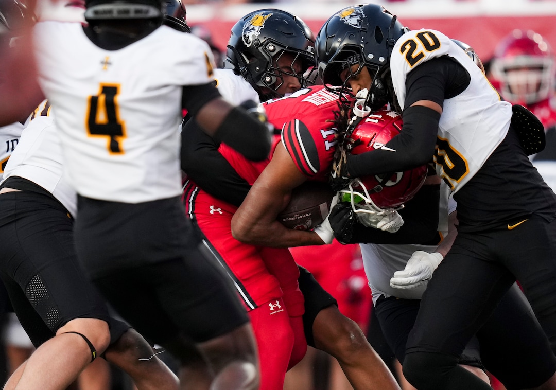 (Bethany Baker  |  The Salt Lake Tribune) Idaho Vandals tackle Utah Utes wide receiver Ricky Johnson (11) during the first half of the game between the Utah Utes and the Idaho Vandals at Rice-Eccles Stadium in Salt Lake City on Thursday, Sept. 3, 2026.