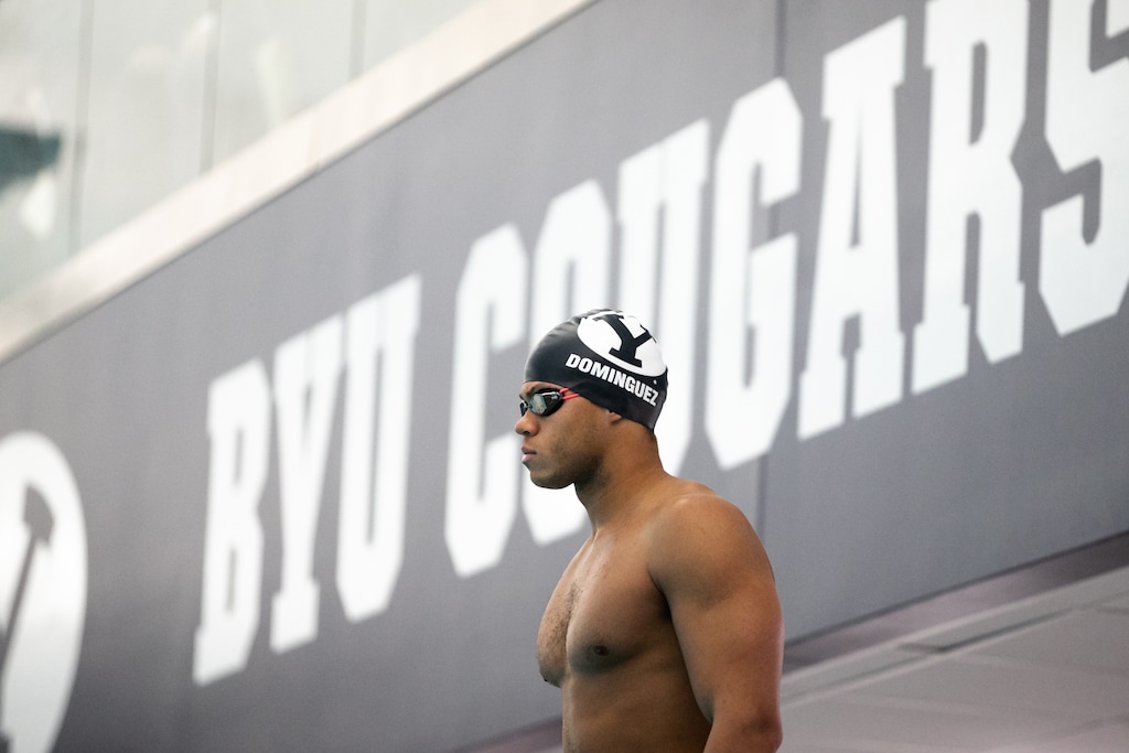 (Photo courtesy of BYU) Josue Dominguez of the Dominican Republic prepares to swim the breaststroke for the BYU swim team, for which he holds school records in the 100- and 200-meter breaststroke. In December 2019, he achieved a qualifying time for the 2020 Olympics and could swim in Tokyo for the Dominican Republic.