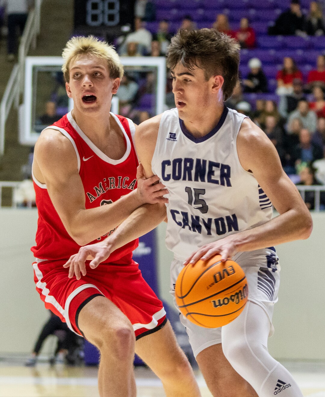 (Rick Egan | The Salt Lake Tribune) Brody Kozlowski, Corner Canyon gets past the defender from American Fork, in the Boys 6A State Championship at Weber State, on Saturday, March 4, 2023.