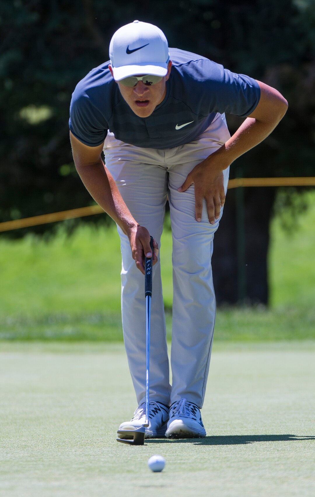 (Rick Egan  |  The Salt Lake Tribune)     Cameron Champ from Sacrament, CA, checks the line of his putt, during the Utah Championship golf event on the Web.com Tour at Oakridge Country Club in Farmington. Champ finished 17-under par to lead the field for the second day in a row. July 13, 2018.