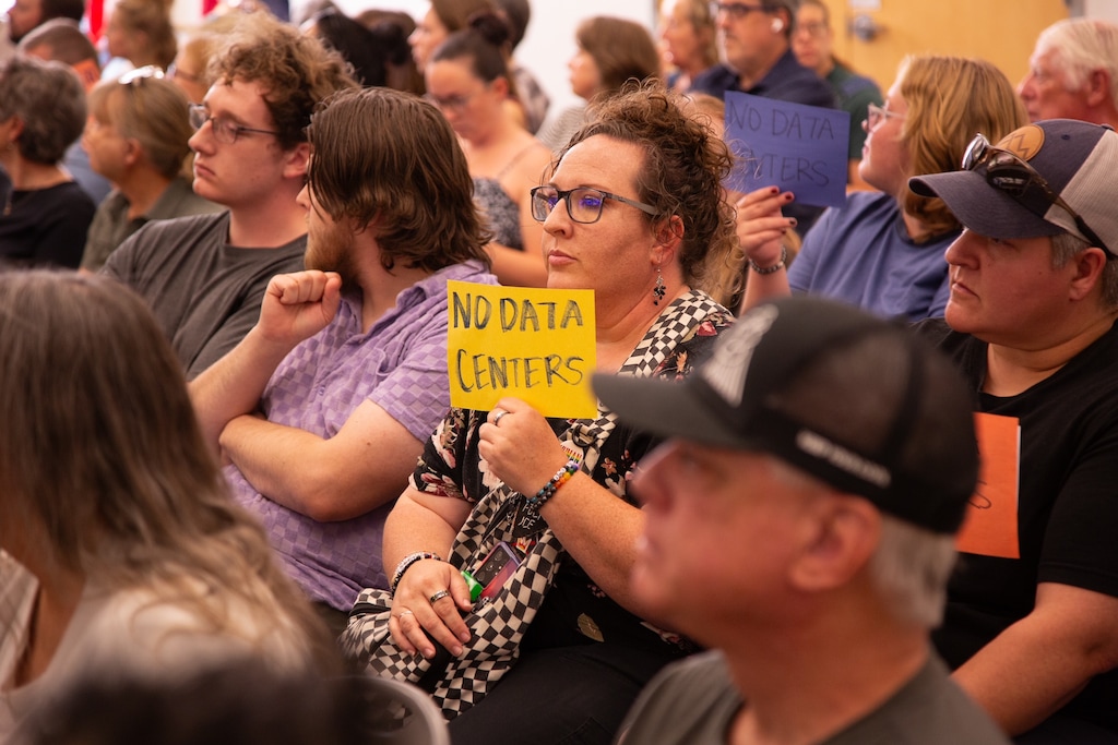 (Utah Department of Environmental Quality) Dozens of Utahns attend a public hearing hosted by the Division of Water Quality to oppose a water discharge permit for the Tooele Valley inland port and data center project on July 27, 2026.