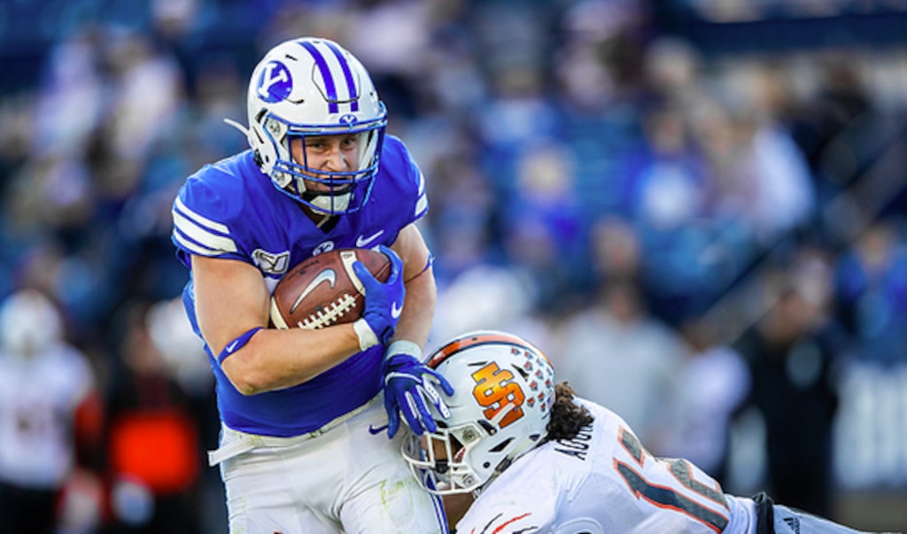 (Photo courtesy of BYU Photo) BYU running back Jackson McChesney grinds for yardage against Idaho State on Saturday, Nov. 16, 2019 at LaVell Edwards Stadium in Provo, Utah.