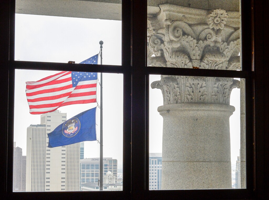 (Chris Samuels | The Salt Lake Tribune) The American flag and Utah state flag outside the Utah Capitol building Tuesday, Jan. 17, 2023.
