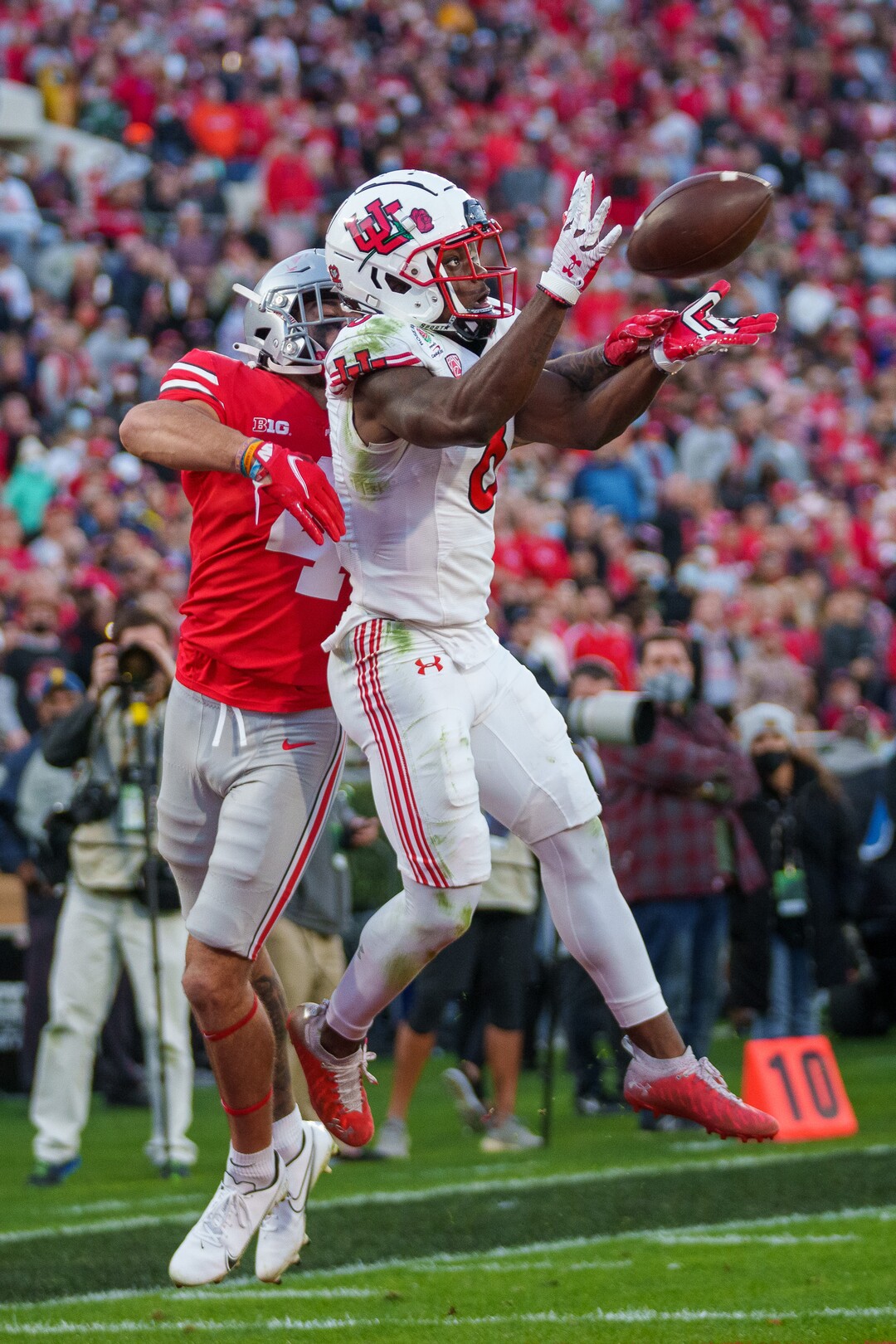 (Trent Nelson  |  The Salt Lake Tribune) Utah Utes cornerback Clark Phillips III (8) intercepts a pass as the Utah Utes face the Ohio State Buckeyes at the Rose Bowl in Pasadena, Calif., on Saturday, Jan. 1, 2022.