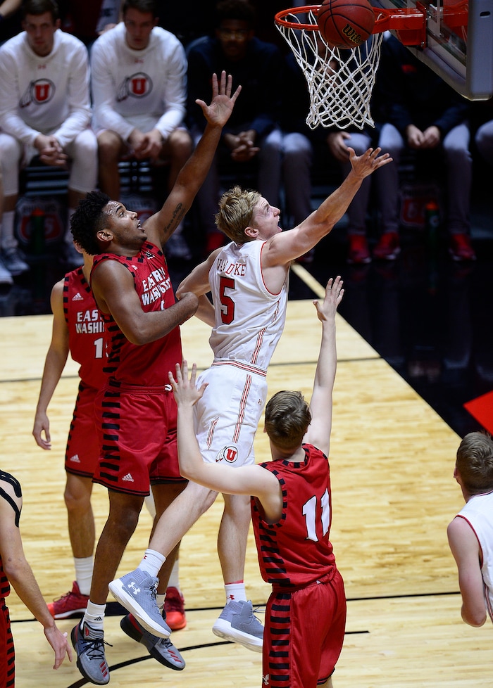 (Scott Sommerdorf   |  The Salt Lake Tribune)   Utah's Parker Van Dyke scores and is fouled during second half play. Utah defeated Eastern Washington 85-69, Friday, November 24, 2017. 