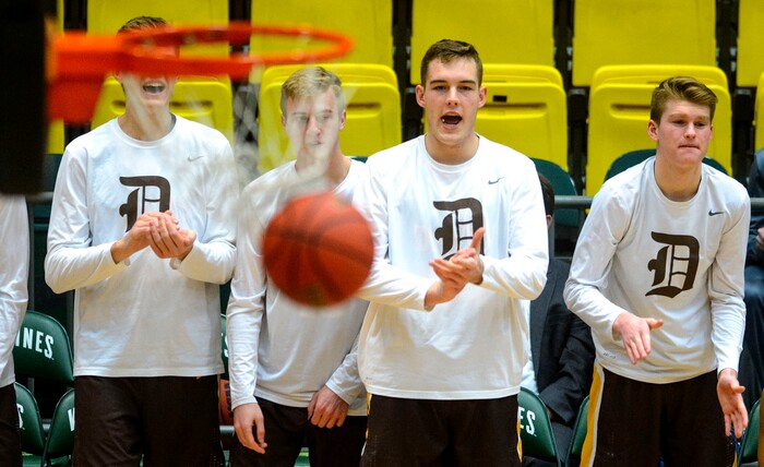 (Steve Griffin  |  The Salt Lake Tribune) The Davis bench celebrates a three-pointer during the Granger versus Davis 6A basketball playoff game at the Utah Valley UniversityÕs UCCU Center in Provo Tuesday Feb. 27, 2018.