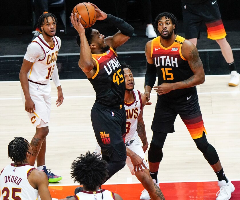 (Leah Hogsten | The Salt Lake Tribune) Utah Jazz guard Donovan Mitchell (45) with a dunk as the Utah Jazz host the Cleveland Cavaliers, Mar. 29, 2021 at Vivint Arena. 