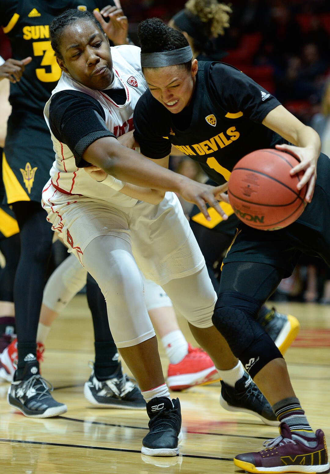 (Francisco Kjolseth  |  The Salt Lake Tribune)  Utah Utes guard/forward Dre'Una Edwards (44) tries to regain control of the ball from Arizona State Sun Devils guard Reili Richardson (1) in Utes' Pac-12 home opener at the Jon M Huntsman Center on Friday, Jan. 4, 2019. Off to one of their best starts in team history, their twelve in a row winning streak came to an end losing to the Sun Devils 63-65.