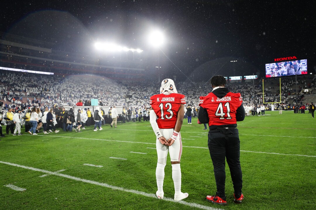 (Meg Oliphant | Special to The Tribune) Nate Johnson (13) and Jonathan Johnson (41) of the Utah Utes look on after losing to Penn State Nittany Lions at Rose Bowl Stadium on Jan. 2, 2023 in Pasadena, Calif.