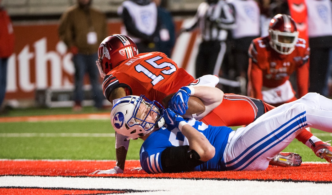 (Rick Egan  |  The Salt Lake Tribune)      Brigham Young tight end Matt Bushman (89) lands in the end zone for a Cougar touchdown, in football action between the Brigham Young Cougars and the Utah Utes, at Rice-Eccles Stadium, Saturday, November 24, 2018.