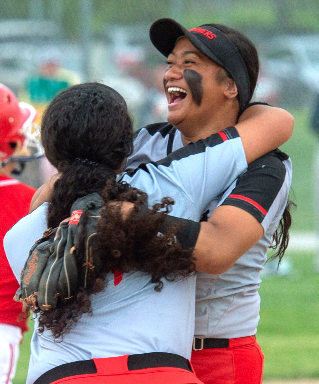 (Rick Egan  |  The Salt Lake Tribune)      Josie Vaenuku and Daisy Taloa celebrate West High’s win over the Bountiful Braves, in the 5A State Championship game in Taylorsville, Thursday May 30, 2019