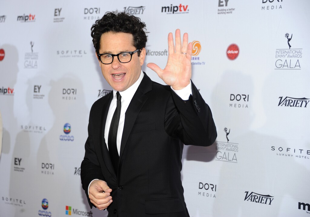 IFILE - In this Nov. 25, 2013 file photo, the "Founders Award" recipient producer and director J.J. Abrams arrives at the 2013 International Emmy Awards Gala at the New York Hilton, in New York.  After resurrecting Star Trek, Abrams has turned to another far away galaxy with Star Wars: The Force Awakens. Making it, he says, has been a constant conversation with himself as a wide-eyed boy, astonished by George Lucas space opera.  (Photo by Evan Agostini/InvisionAP, File)