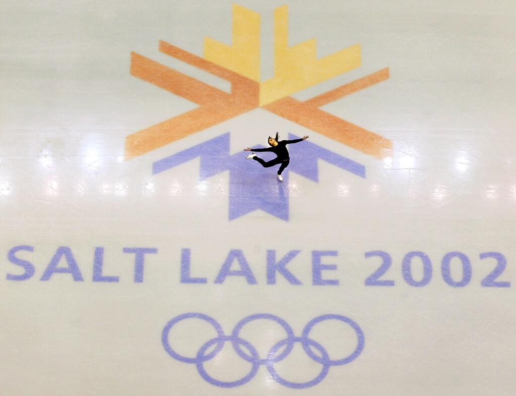 FILE - In this Feb. 8, 2002, file photo, U.S. champion Michelle Kwan practices for the women's short program for the Winter Olympic Games at Salt lake Ice Center in Salt Lake City. A committee studying the possibility of Salt Lake City making a bid to host another Winter Olympics says it would rather host the games in 2030, but would be ready if for some reason they are needed for 2026. (AP Photo/Doug Mills, File)