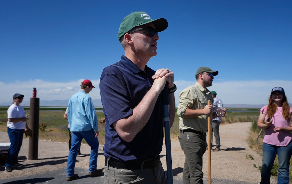 (Francisco Kjolseth | The Salt Lake Tribune) Gov. Spencer Cox, after signing an executive order establishing a statewide framework to guide the evaluation and development of large data center projects in Utah, participates in a service project near the Great Salt Lake on Friday, May 29, 2026. 