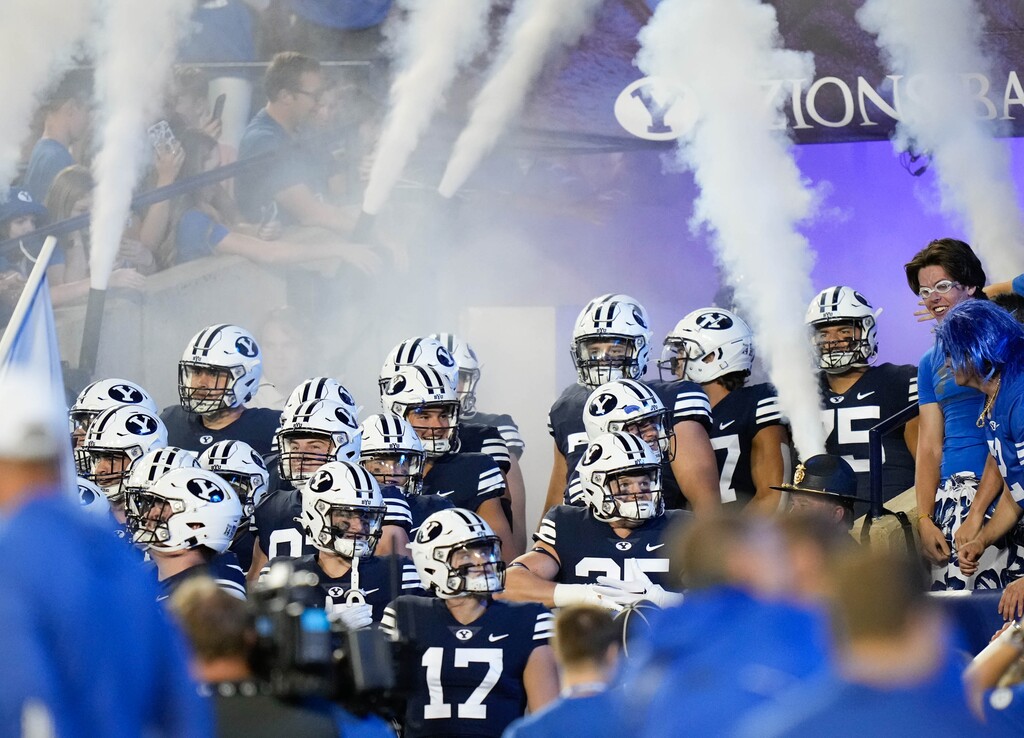 (Francisco Kjolseth | The Salt Lake Tribune) in football action between the Brigham Young Cougars and the Wyoming Cowboys at LaVell Edwards Stadium in Provo, on Saturday, Sept. 24, 2022.