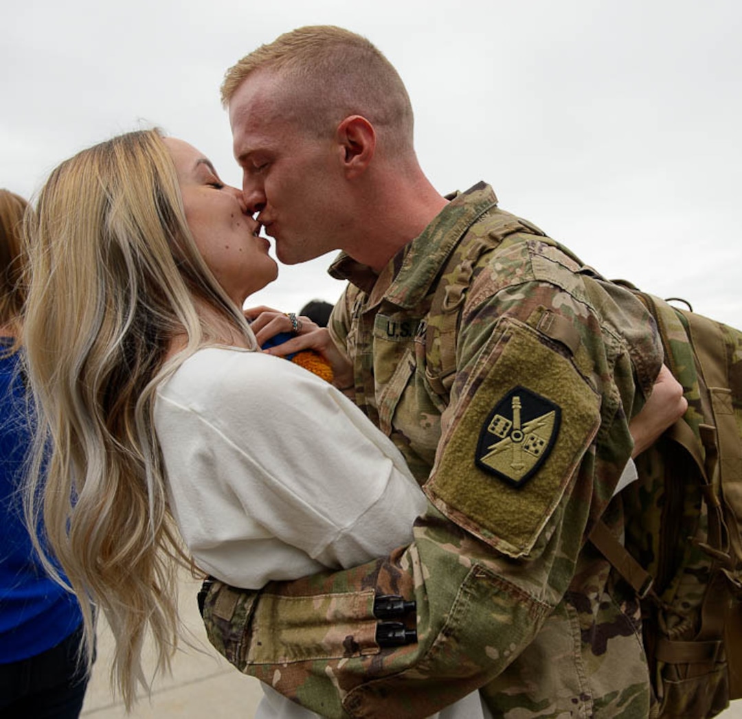 (Trent Nelson  |  The Salt Lake Tribune)  Specialist Porter Black is welcomed home by his wife Taylor as almost 100 Soldiers from Utah Army National Guard’s Echo Battery, 1st Battalion, 145th Field Artillery, “Big Red” return after a 10-month Middle East deployment, on Tuesday April 9, 2019 at Wright Air Base in Salt Lake City.