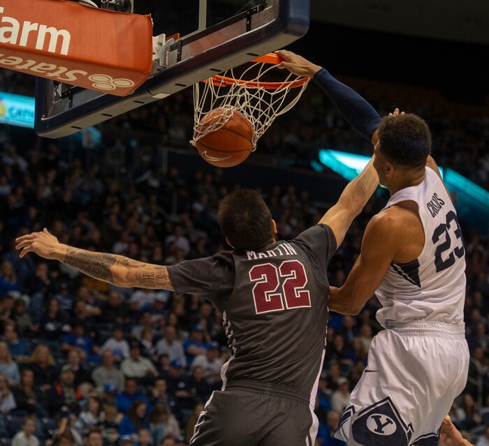 (Rick Egan  |  The Salt Lake Tribune)       Brigham Young Cougars forward Yoeli Childs (23) dunks the ball over Santa Clara Broncos forward Josh Martin (22), in basketball action between Brigham Young Cougars and Santa Clara Broncos at the Marriott Center in Provo, Saturday, Jan. 12, 2019.


