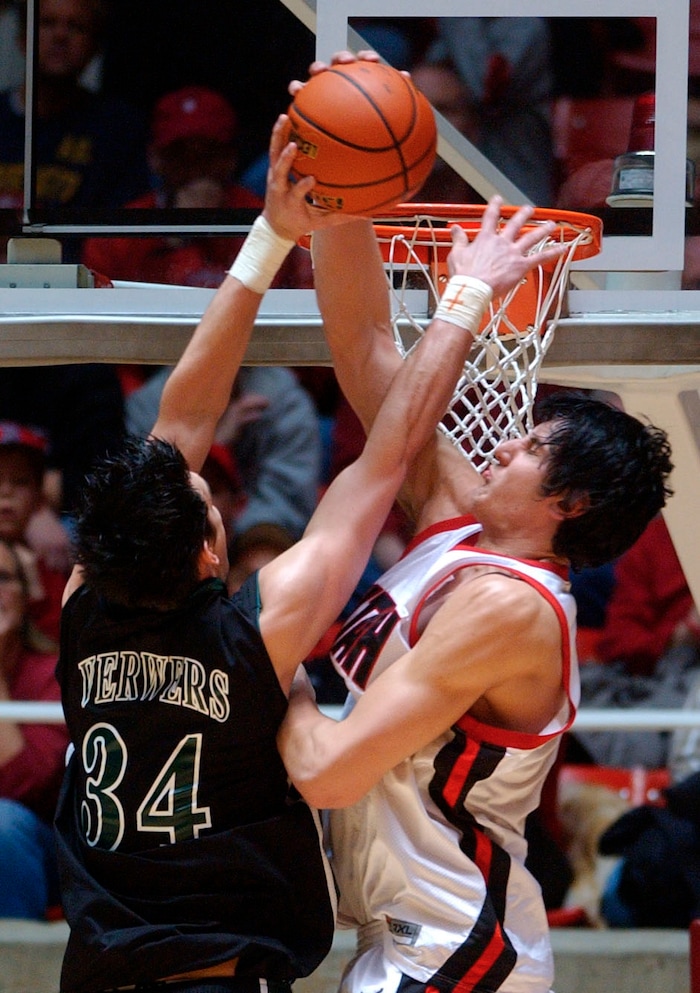 Andrew Bogut gets a big block for the Utes, as he denies Stephen Verwers late  in the game. Bogut had a career high 33 points in tonights game, Utes vs Colorado State, Saturday night at the Huntsman Center.