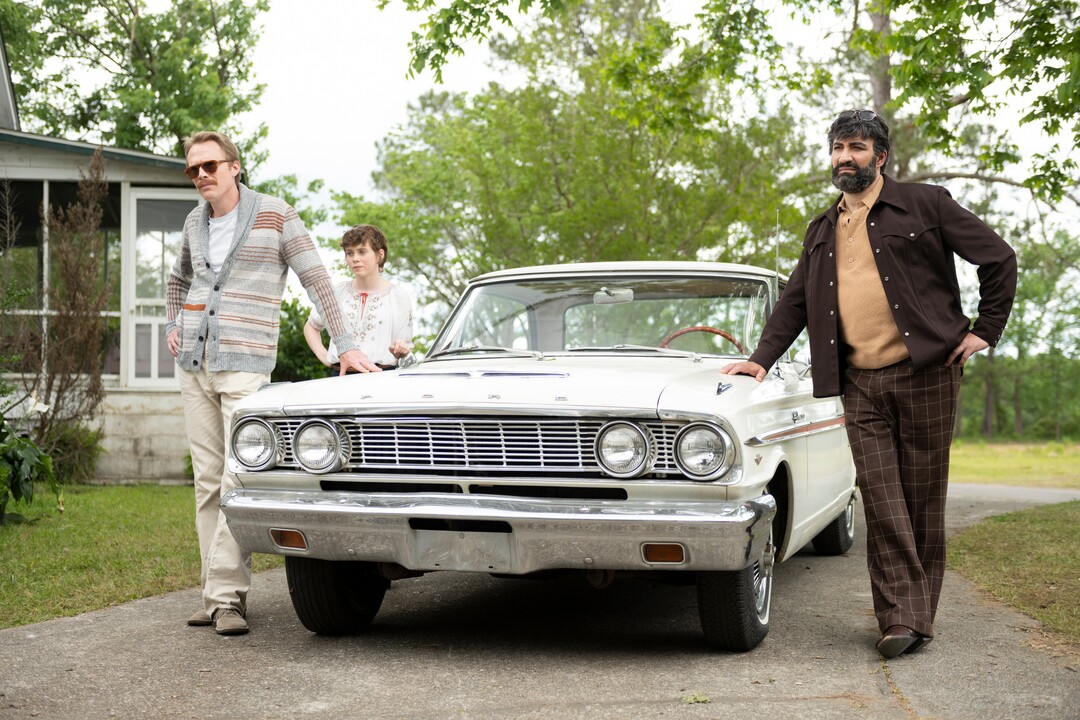(Brownie Harris  |  Amazon Studios) Frank (Paul Bettany, left) goes on a road trip in 1973 with his niece Beth (Sophia Lillis) and his lover Wally (Peter Macdissi) in the drama "Uncle Frank."