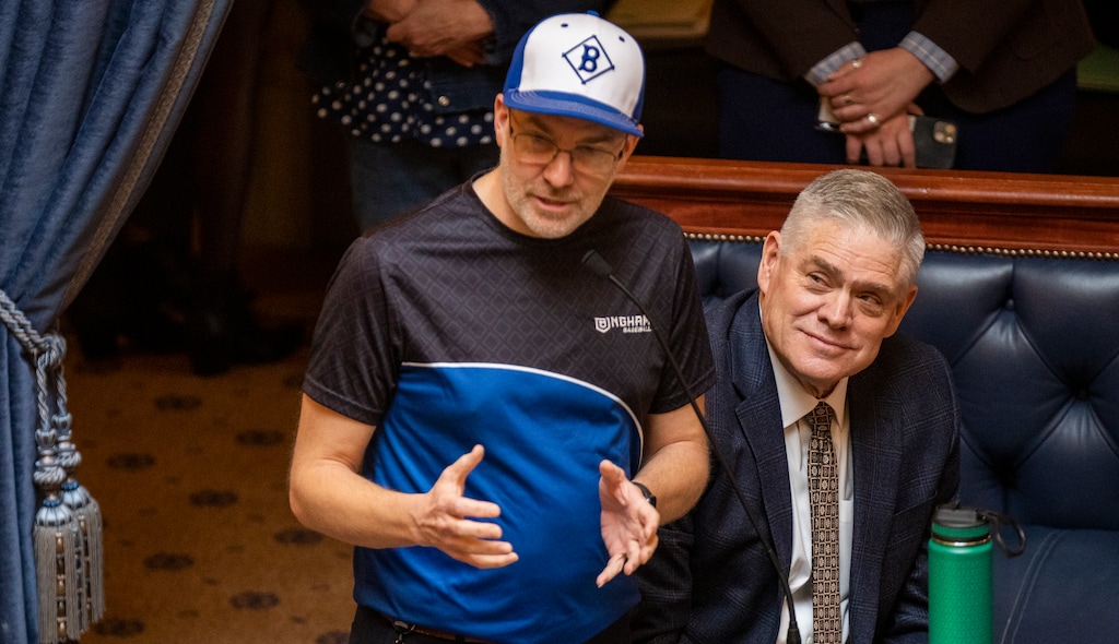 (Rick Egan | The Salt Lake Tribune)  Sen. Lincoln Fillmore, R-South Jordan, wears his little league baseball coach uniform, while he talks about bringing Major League Baseball to Utah, with Dale Murphy by his side, in the Senate Chambers, on Tuesday, Jan. 23, 2024. Utah lawmakers passed bills funding billions in taxpayer dollars for an NHL arena and MLB stadium.