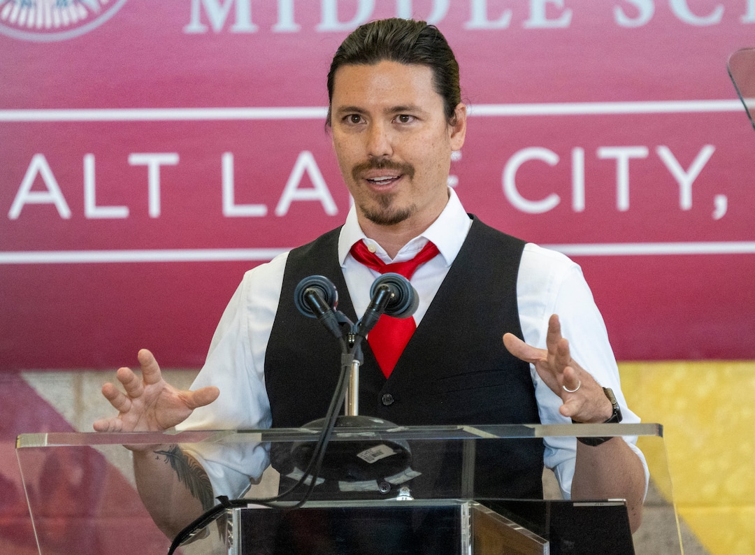 (Rick Egan | The Salt Lake Tribune) John Arthur Utah's teacher of the year, says a few words before First Lady Jill Biden's speech at Glendale Middle School, on Wednesday, May 5, 2021.