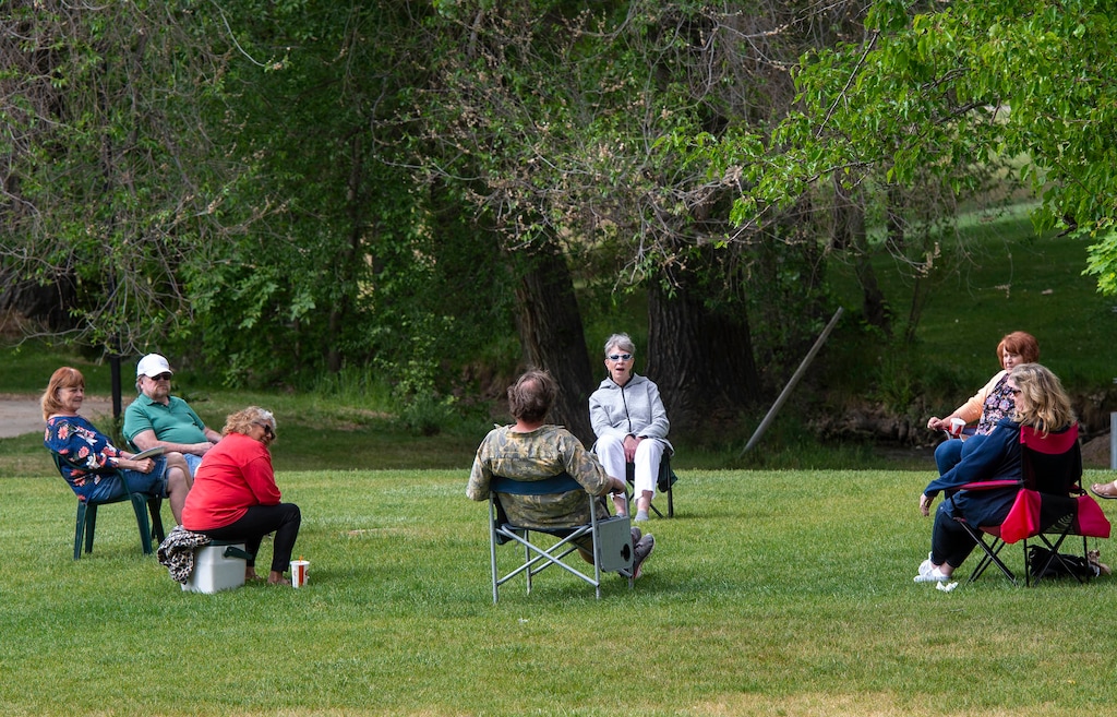 (Rick Egan  |  The Salt Lake Tribune)   A group of people keep their distance as they meet at Sugarhouse Park, Thursday May 14, 2020.