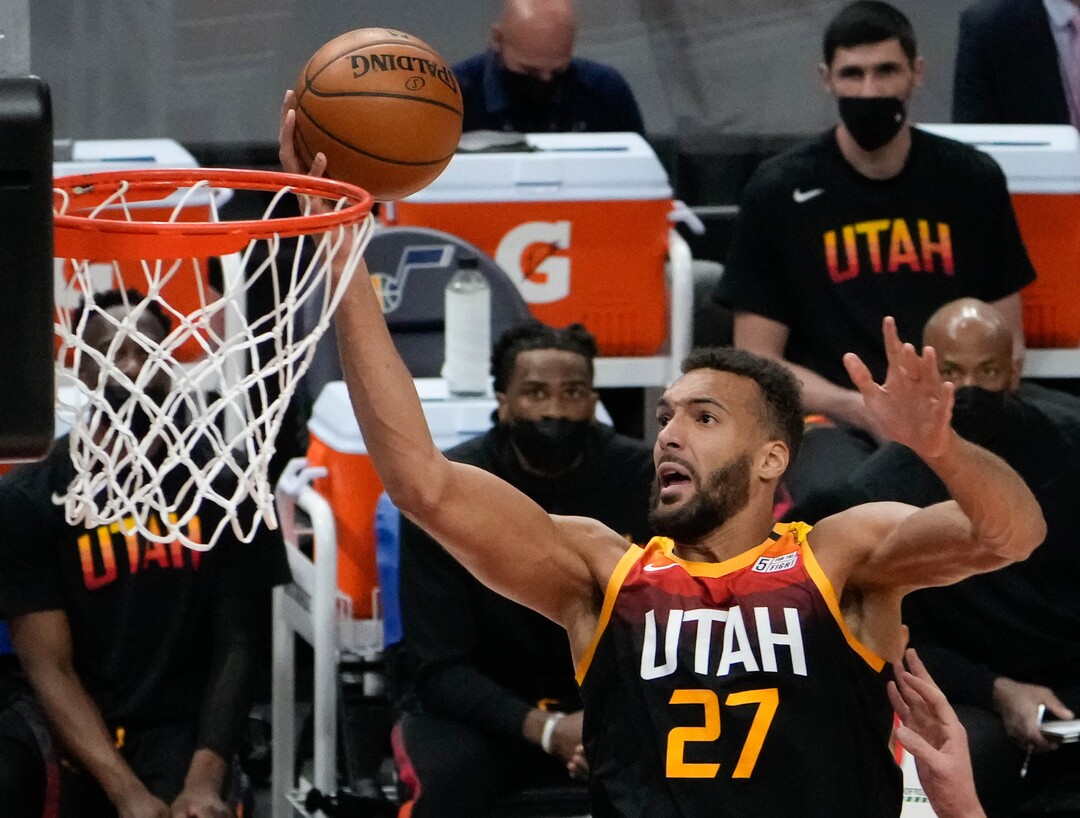 (Francisco Kjolseth | The Salt Lake Tribune) Utah Jazz center Rudy Gobert (27) drives to the basket in NBA action between the Utah Jazz and the Portland Trail Blazers, at Vivint Smart Home Arena, on Wednesday, May 12, 2021.