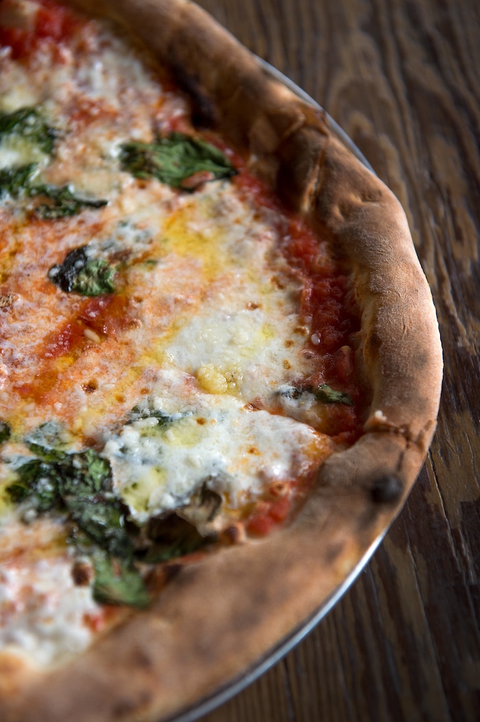 Leah Hogsten  |  The Salt Lake Tribune
Pizza Nono's Margherita with tomato, fresh mozzarella, Grana cheese, basil and extra virgin olive oil, $10. Pizza Nono, the new wood-fired pizza "store" in SLC's 9th and 9th neighborhood offers "quality and simple" pizzas, artisan salads and seasonal sides. 

