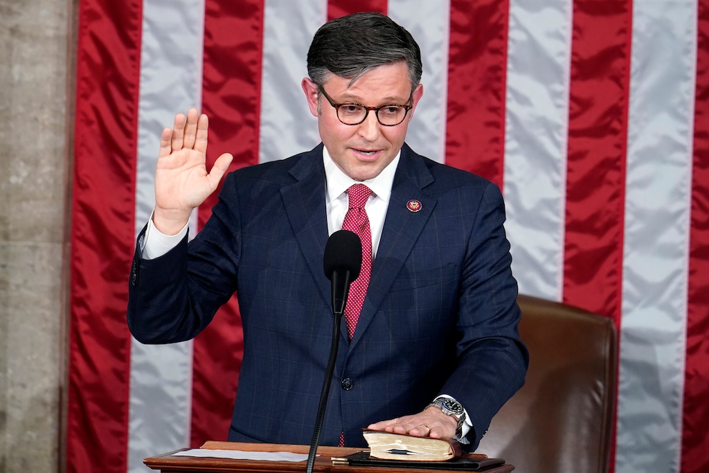 (Alex Brandon | AP) Rep. Mike Johnson, R-La., takes the oath to be the new House speaker at the Capitol in Washington on Wednesday, Oct. 25, 2023.