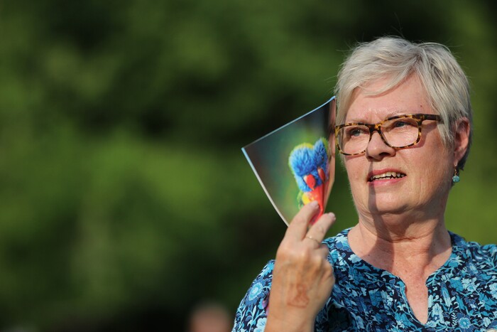 (Daniel Carde | for The Salt Lake Tribune) Robyn Card of Mapleton fans herself down before the World Folkfest at the Springville Arts Park, Springville, Thursday, Aug. 1, 2018. The temperature was 90 at the start of the folkfest according to The Weather ChannelÕs app.
