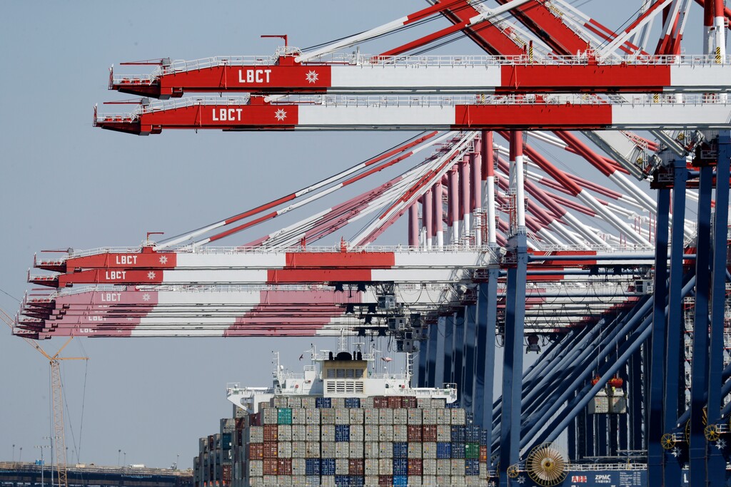 (AP Photo/Marcio Jose Sanchez) A cargo ship being unloaded Aug. 22, 2018, at the Port of Long Beach in Long Beach, Calif., a conduit for Utah's seaborne exports to China. Business leaders in the Beehive State continue to warn of damaging effects to Utah's economy from a widening trade war.