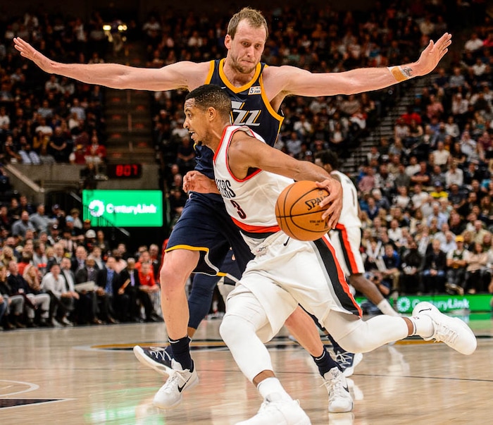 (Trent Nelson | The Salt Lake Tribune)  Portland Trail Blazers guard CJ McCollum (3) defended by Utah Jazz forward Joe Ingles (2) as the Utah Jazz host the Portland Trail Blazers, NBA basketball in Salt Lake City, Wednesday November 1, 2017.