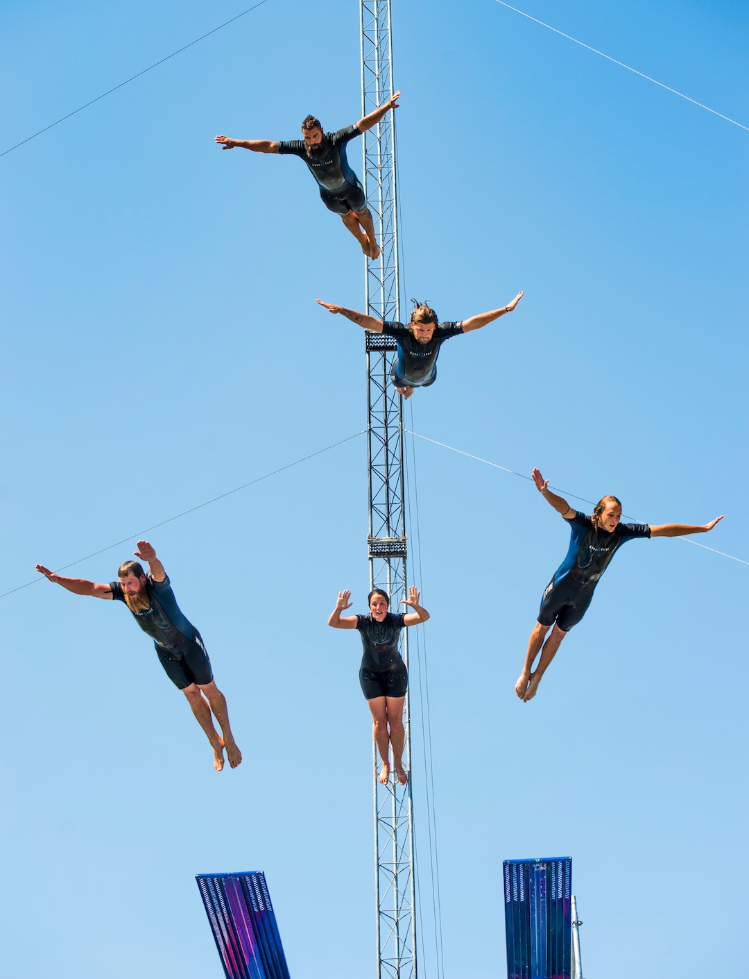 (Rick Egan  |  The Salt Lake Tribune)      Five divers from the Flying Fools High Dive show, dive into a 10-foot pool of water at the same time, on opening day of the Utah State Fair, Thursday, Sept. 6, 2018.