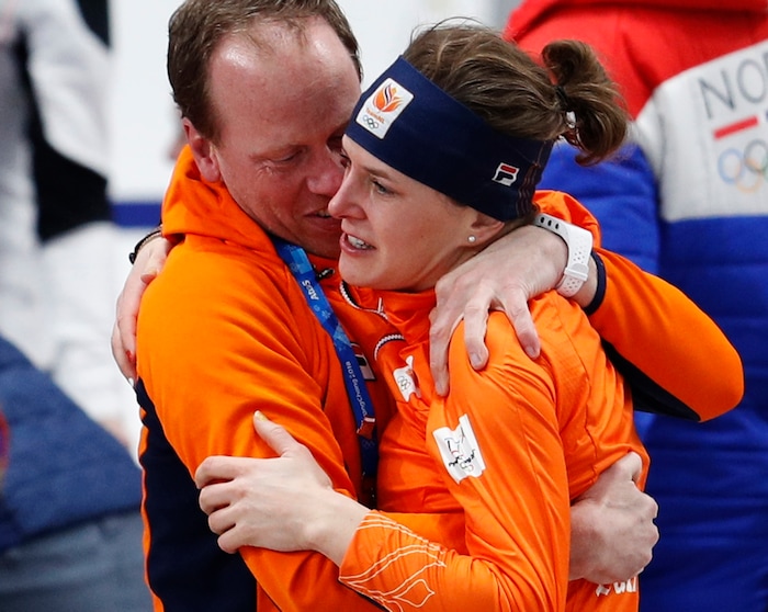 Gold medallist Ireen Wust of Netherlands hugs her coach after the women's 1,500 meters speedskating race at the Gangneung Oval at the 2018 Winter Olympics in Gangneung, South Korea, Monday, Feb. 12, 2018. (AP Photo/John Locher)