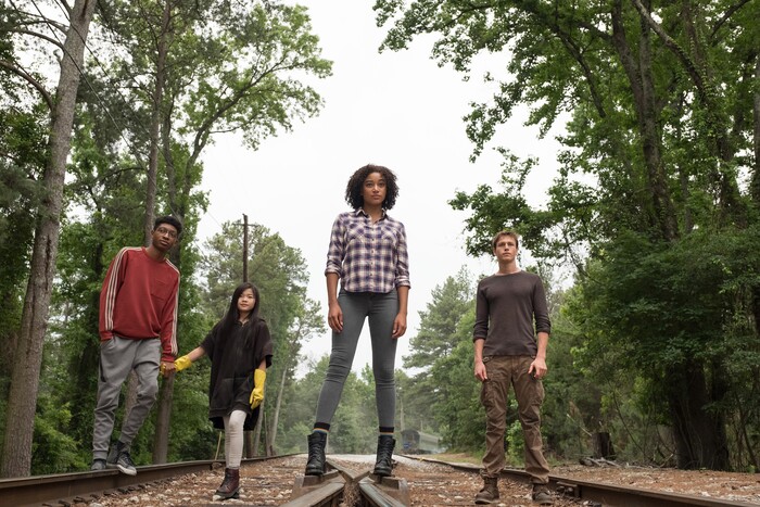 (Daniel McFadden  |  courtesy 20th Century Fox) Teens with special powers — from left: Chubs (Skylan Brooks), Zu (Miya Cech), Ruby (Amandla Stenberg) and Liam (Harris Dickinson) seek to escape persecution in the dystopian thriller "The Darkest Minds," to be released August 3, 2018.